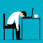tired man at desk
